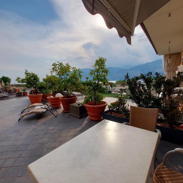 Villa Treccani Apartments Мальчезине Номер фото